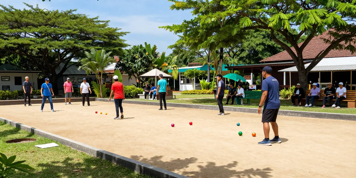 Permainan petanque di fopikotamakassar.org menghadirkan suasana ceria dengan pemain berlomba di lapangan.